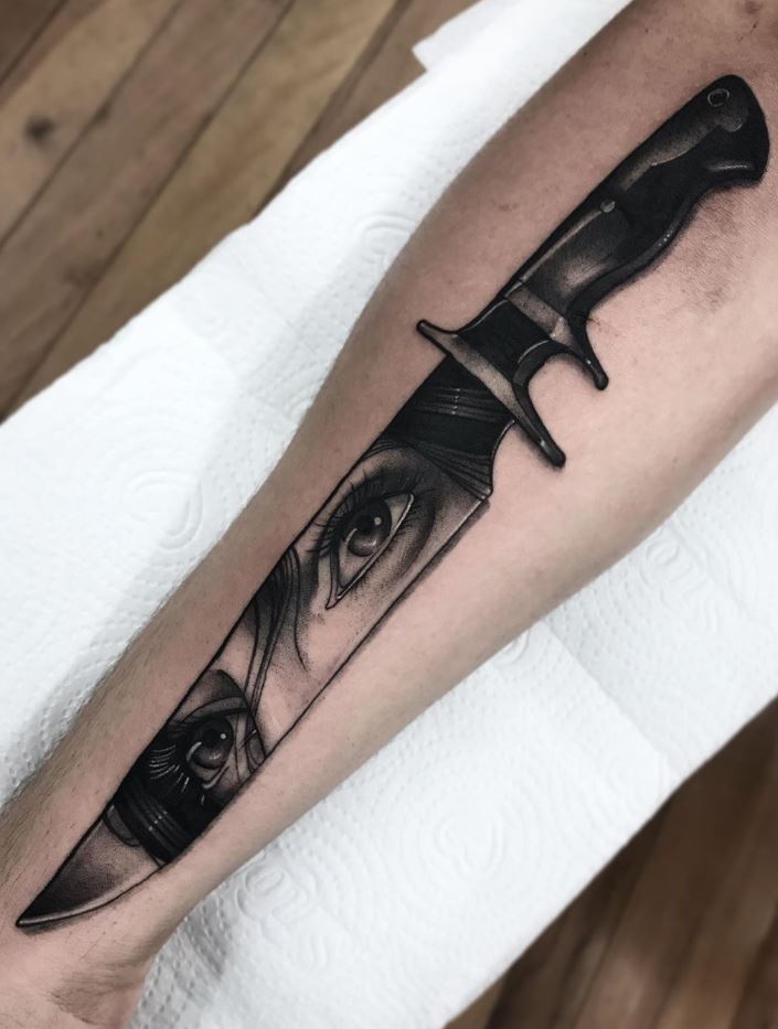 Black And Gray Blade Tattoo