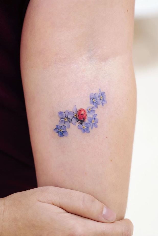Ladybug And Flower Tattoo
