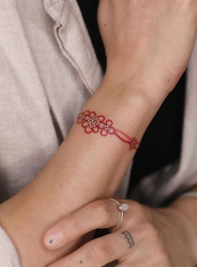 Red-Stringed Jade Bracelet Tattoo