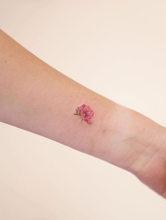 Tiny Pink Flower Tattoo