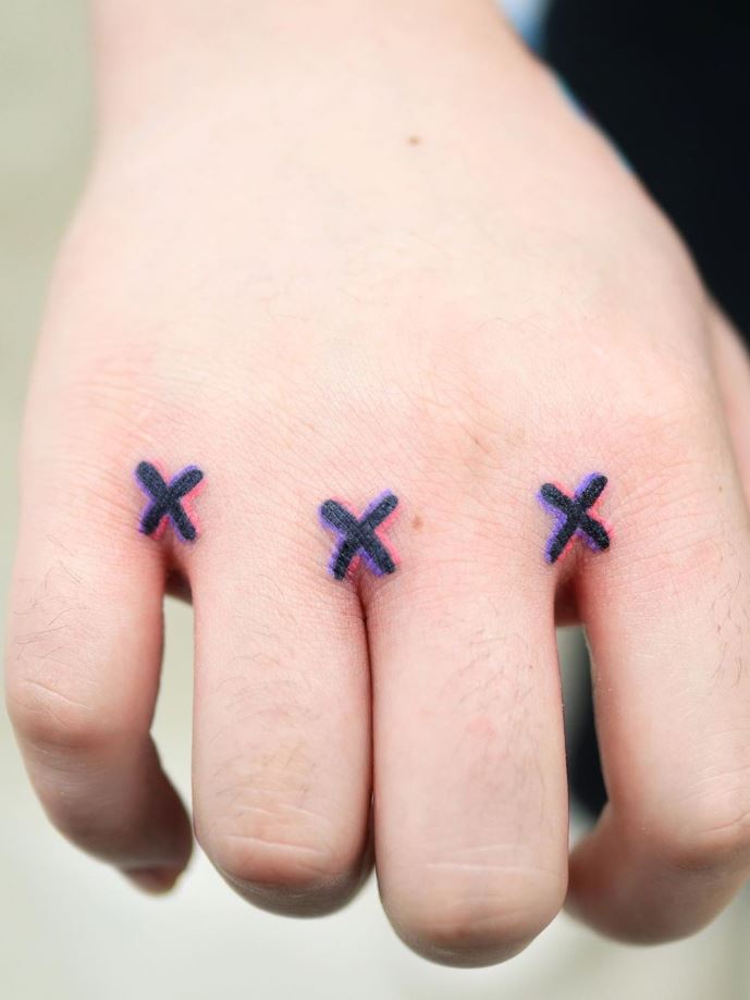 Tiny X Tattoo