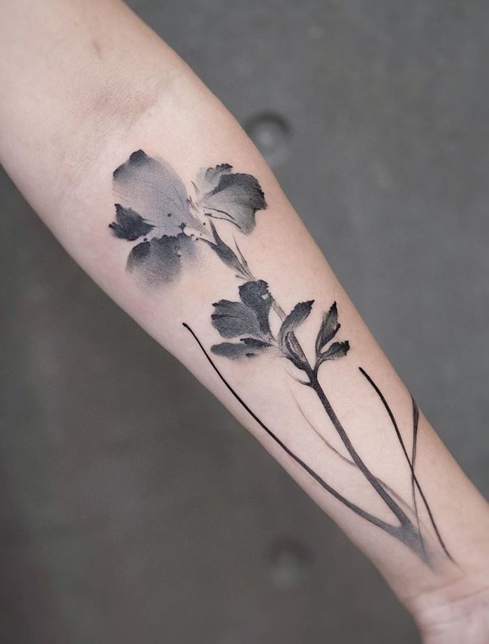 Gray Flowers Tattoo