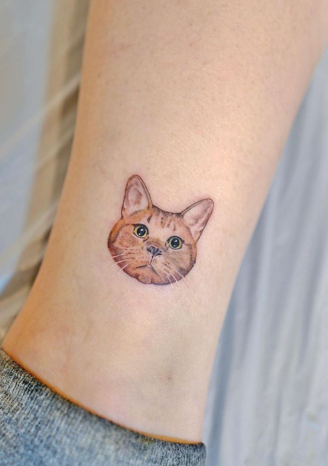 Small Cat Tattoo - Get an InkGet an Ink